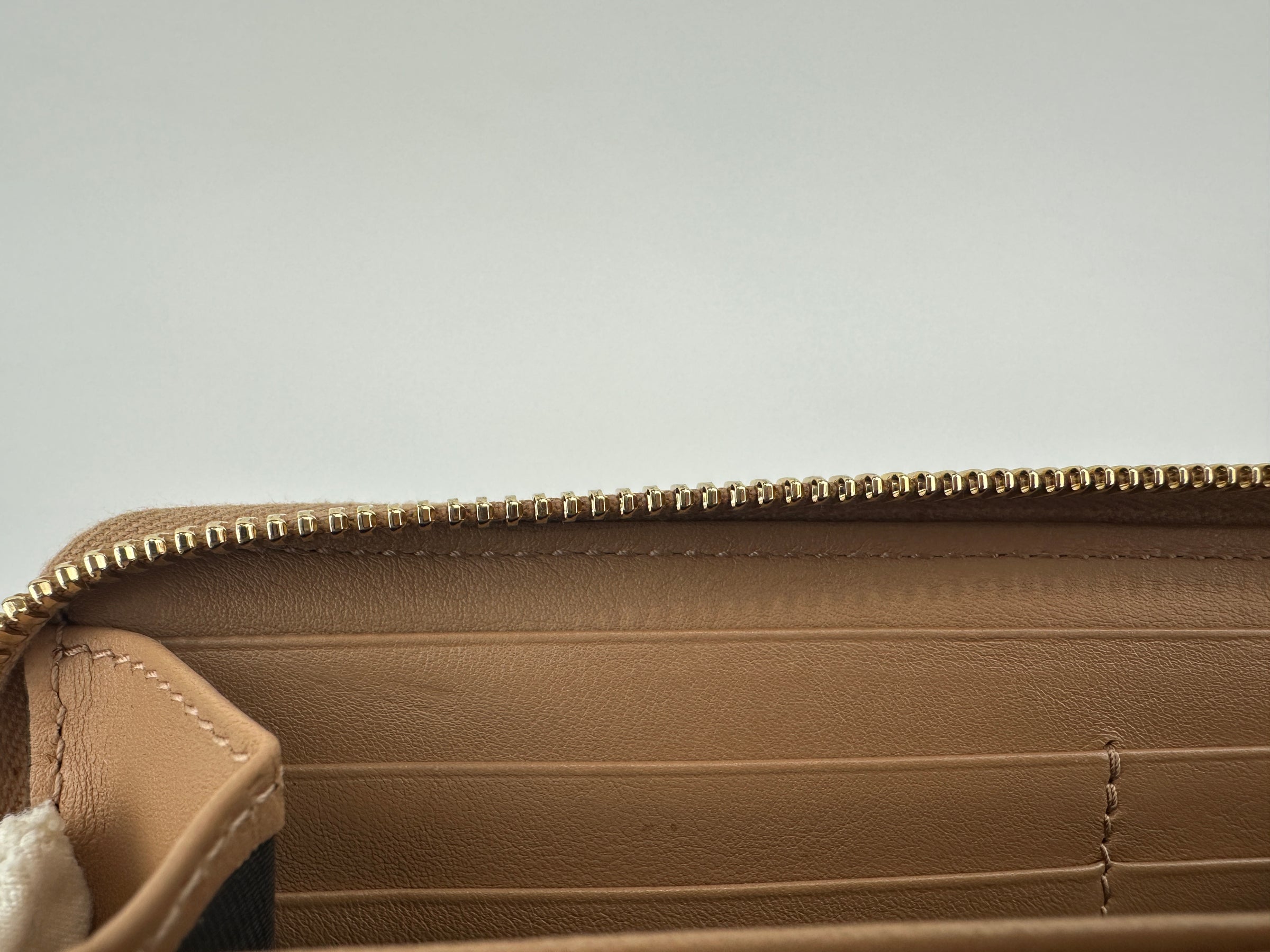 323397 GG Guccissima / Micro Guccissima Beige Leather Zip Around Long Wallet