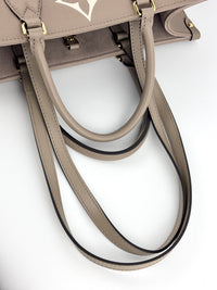 M45494 OnTheGo MM Bicolor Monogram Empreinte Leather Tourterelle / Crème - Glampot
