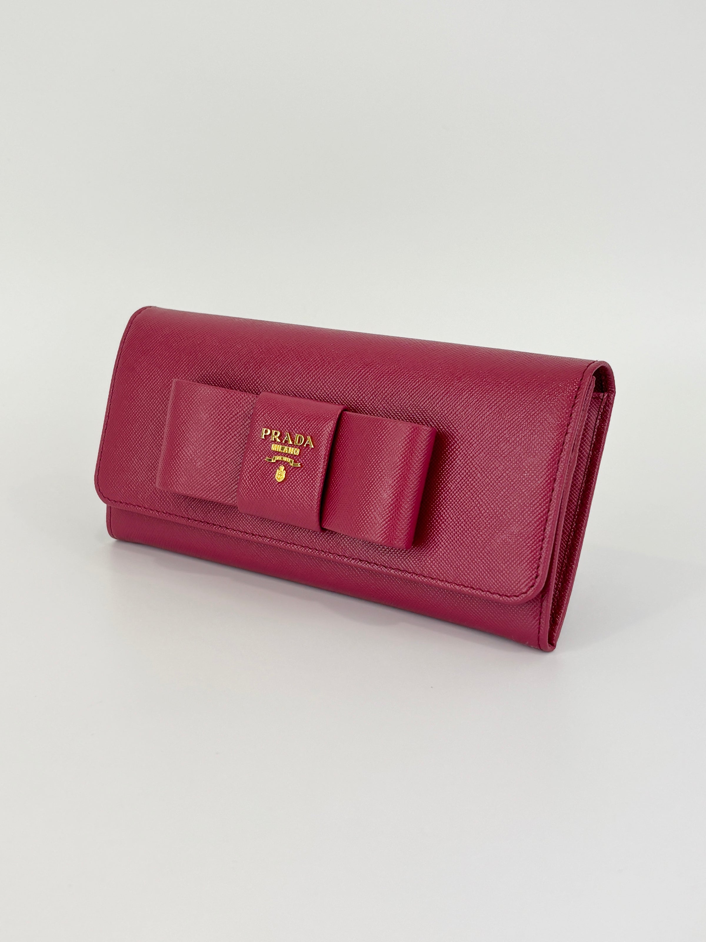 1M1132 Saffiano Fuoco Ibisco Bow Continental Wallet