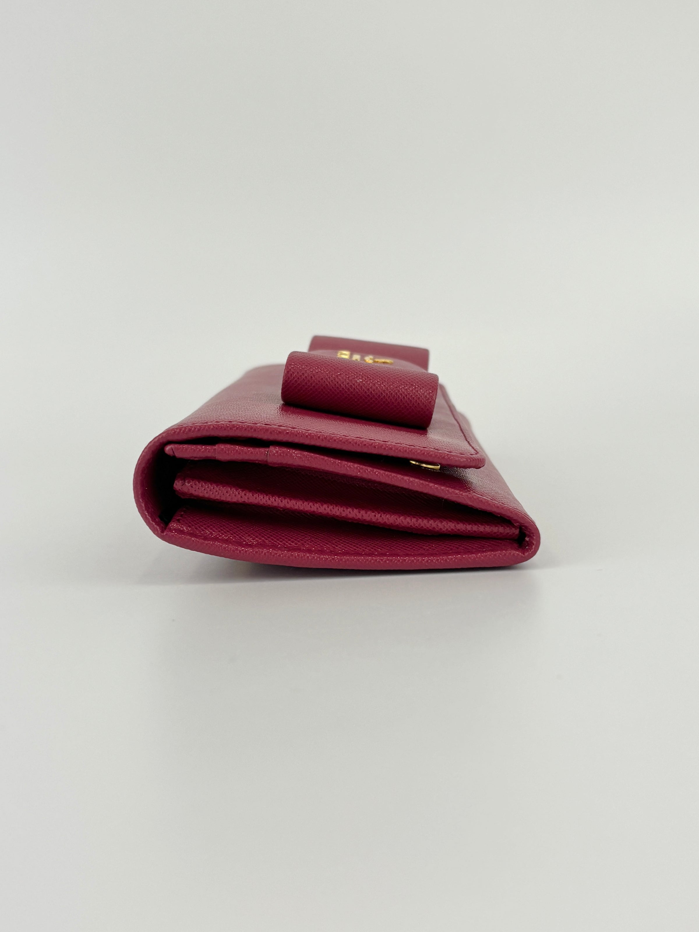 1M1132 Saffiano Fuoco Ibisco Bow Continental Wallet