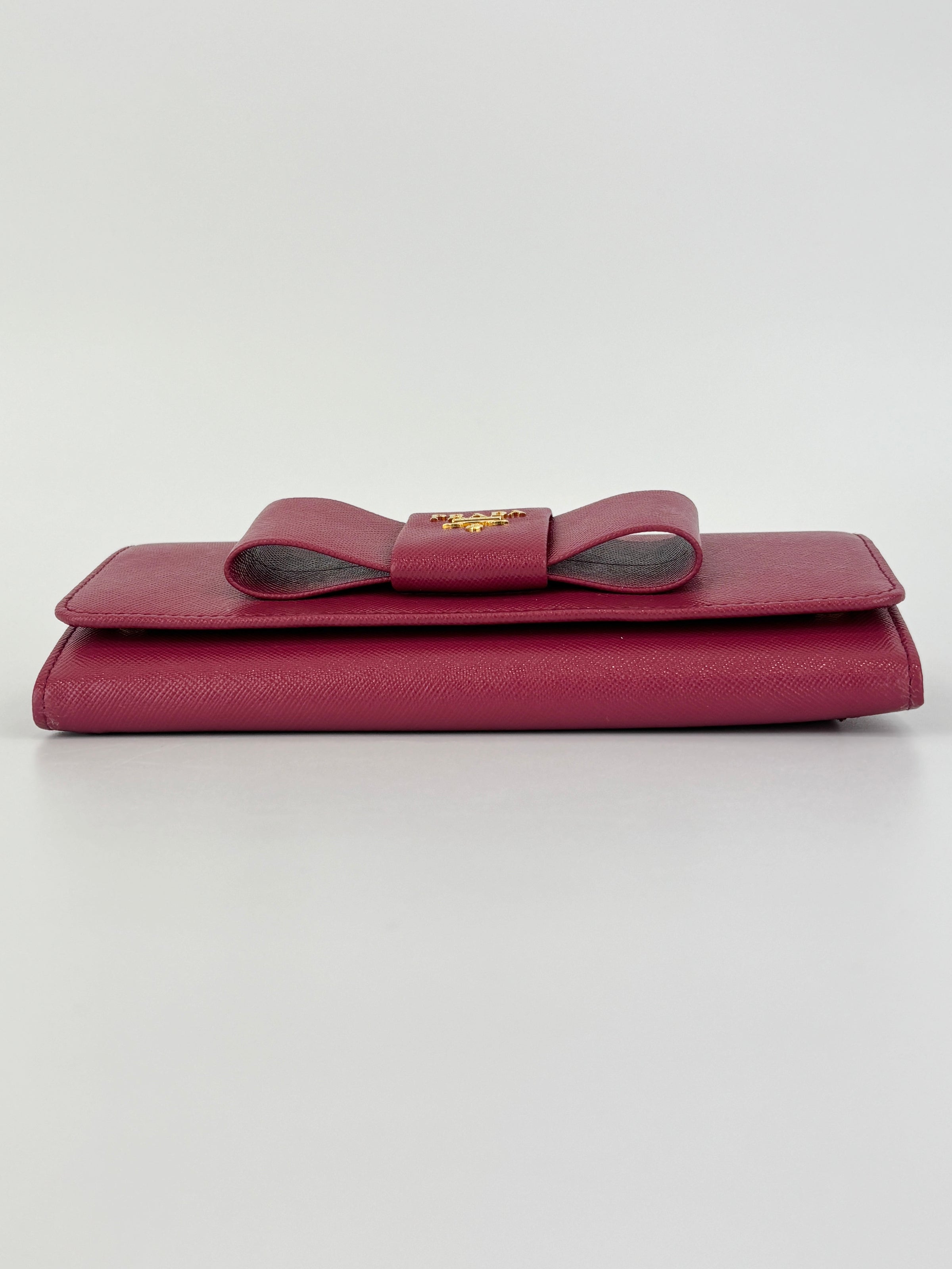 1M1132 Saffiano Fuoco Ibisco Bow Continental Wallet