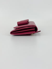 1M1132 Saffiano Fuoco Ibisco Bow Continental Wallet