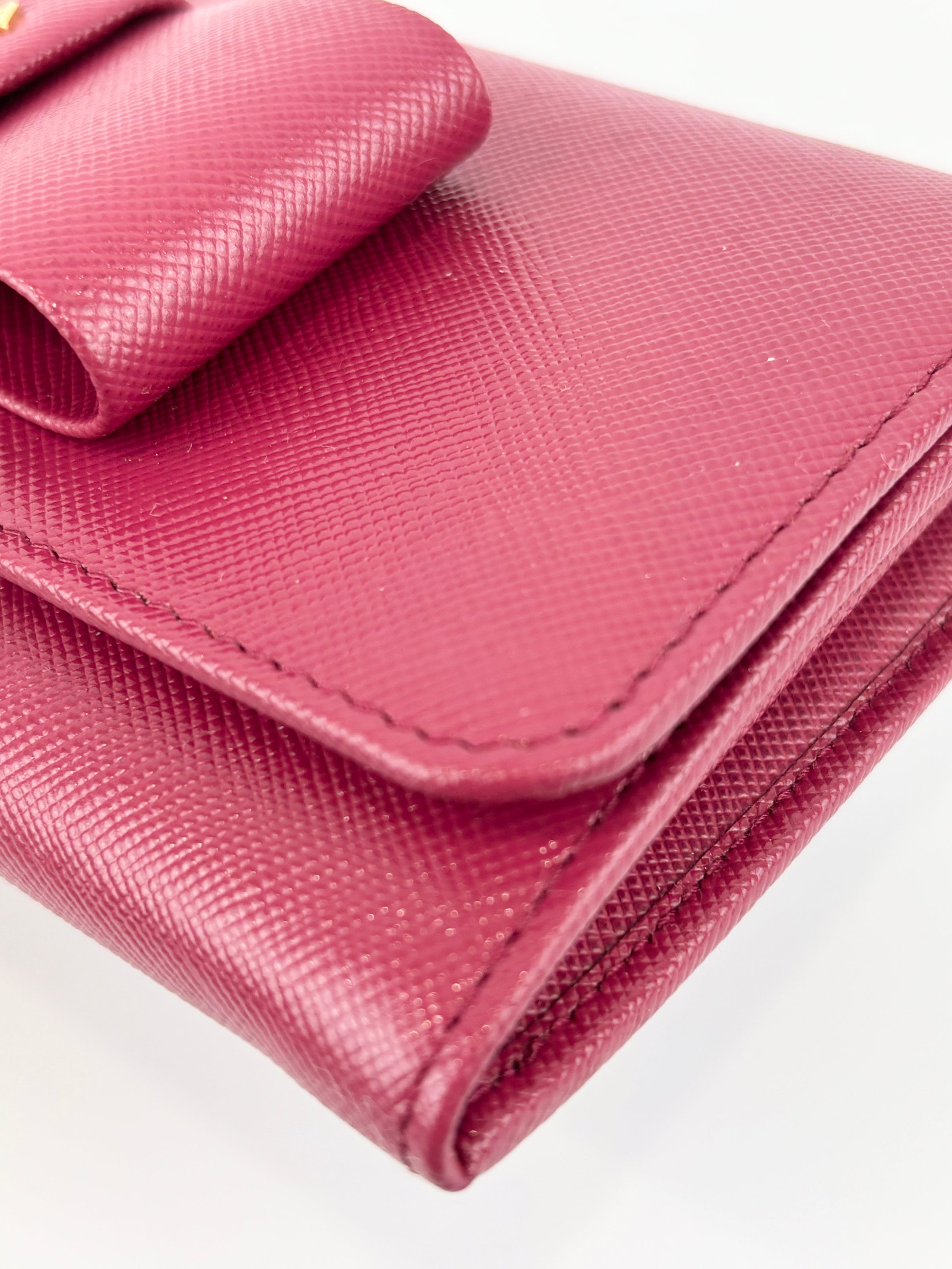 1M1132 Saffiano Fuoco Ibisco Bow Continental Wallet