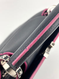 Capucines BB in Black Taurillon Leather/Fuschia SHW