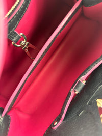 Capucines BB in Black Taurillon Leather/Fuschia SHW