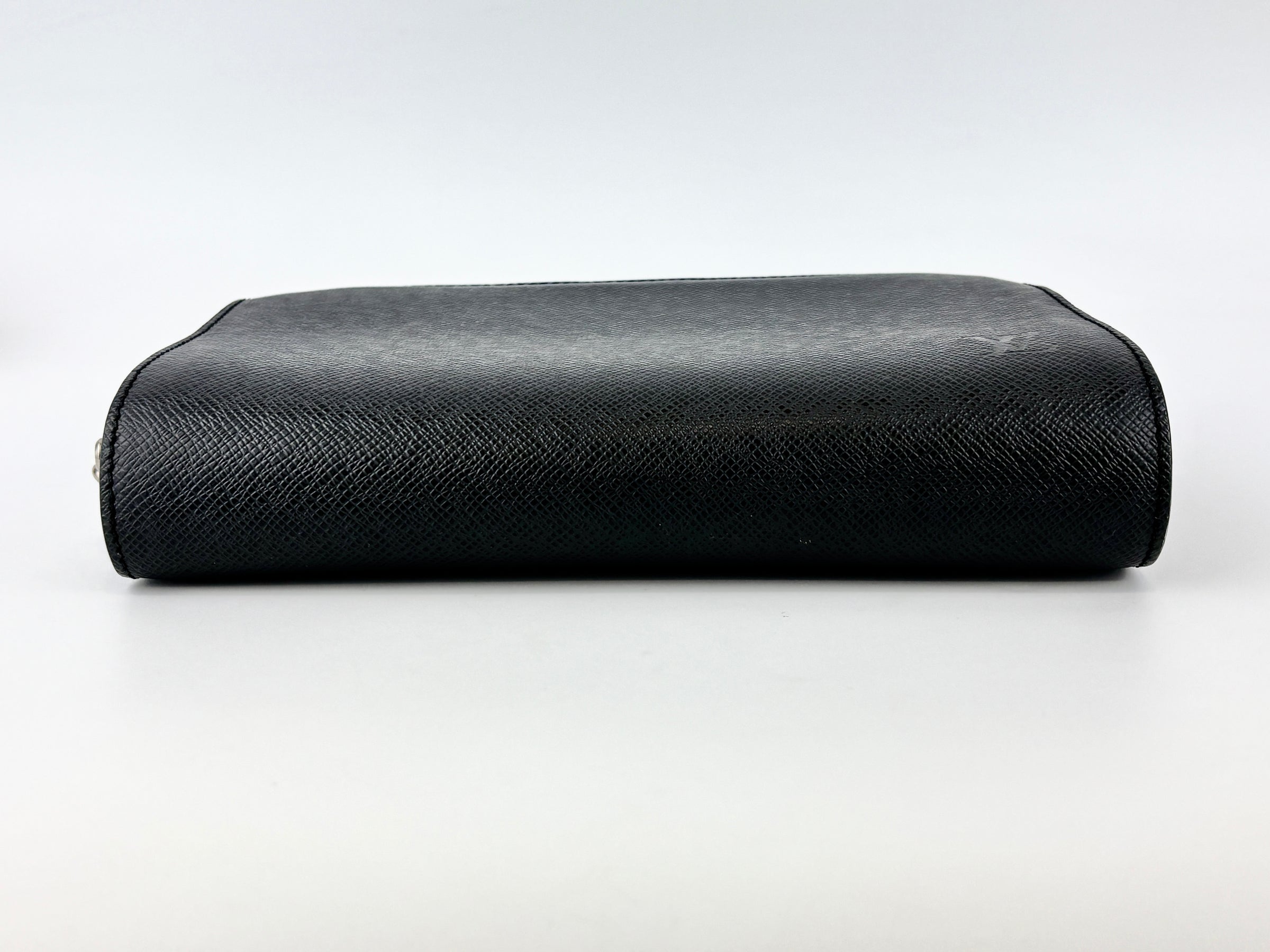 M30182 Taiga Leather Pochette Baikal Clutch
