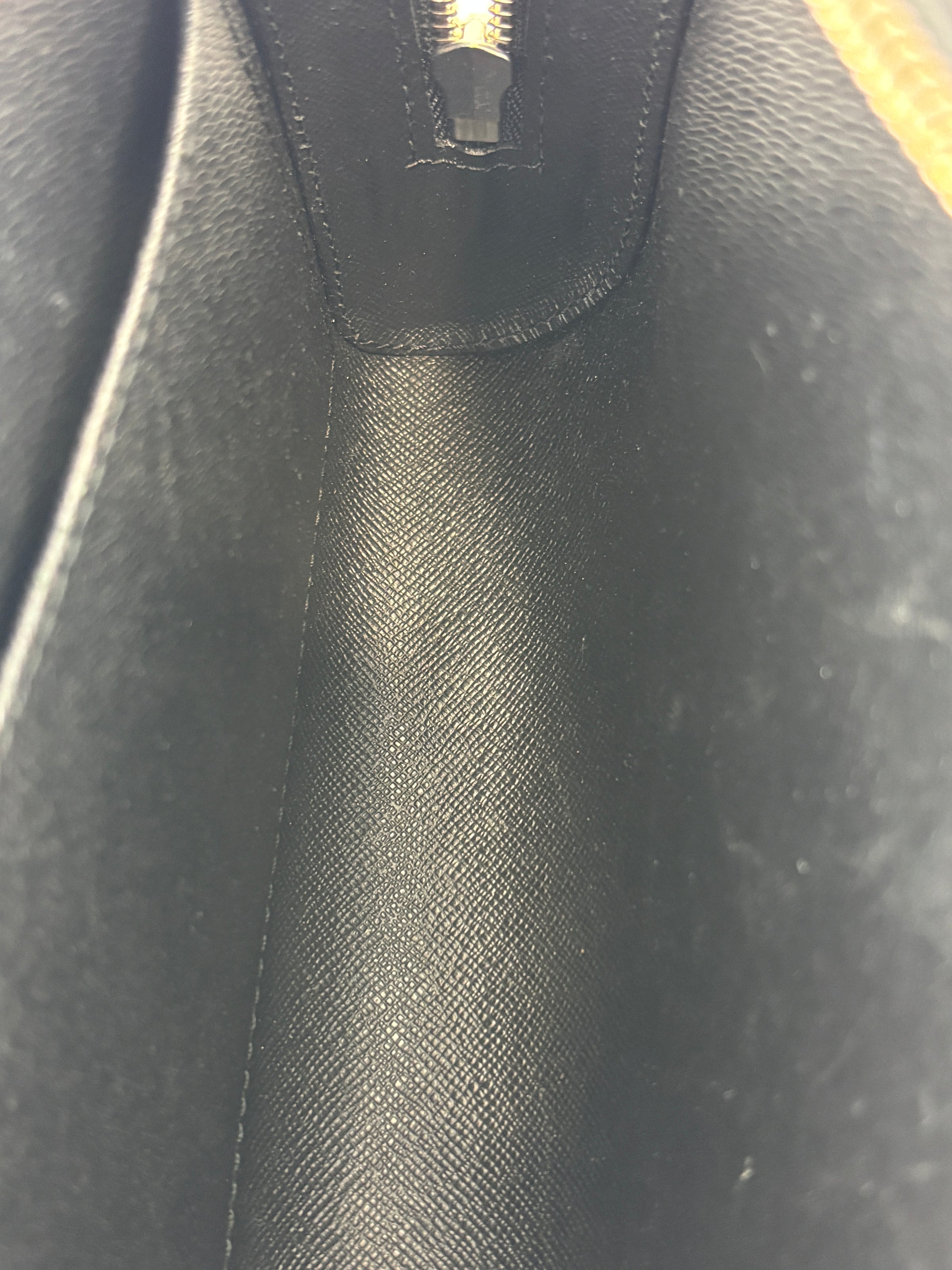 M30182 Taiga Leather Pochette Baikal Clutch