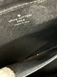 M30182 Taiga Leather Pochette Baikal Clutch