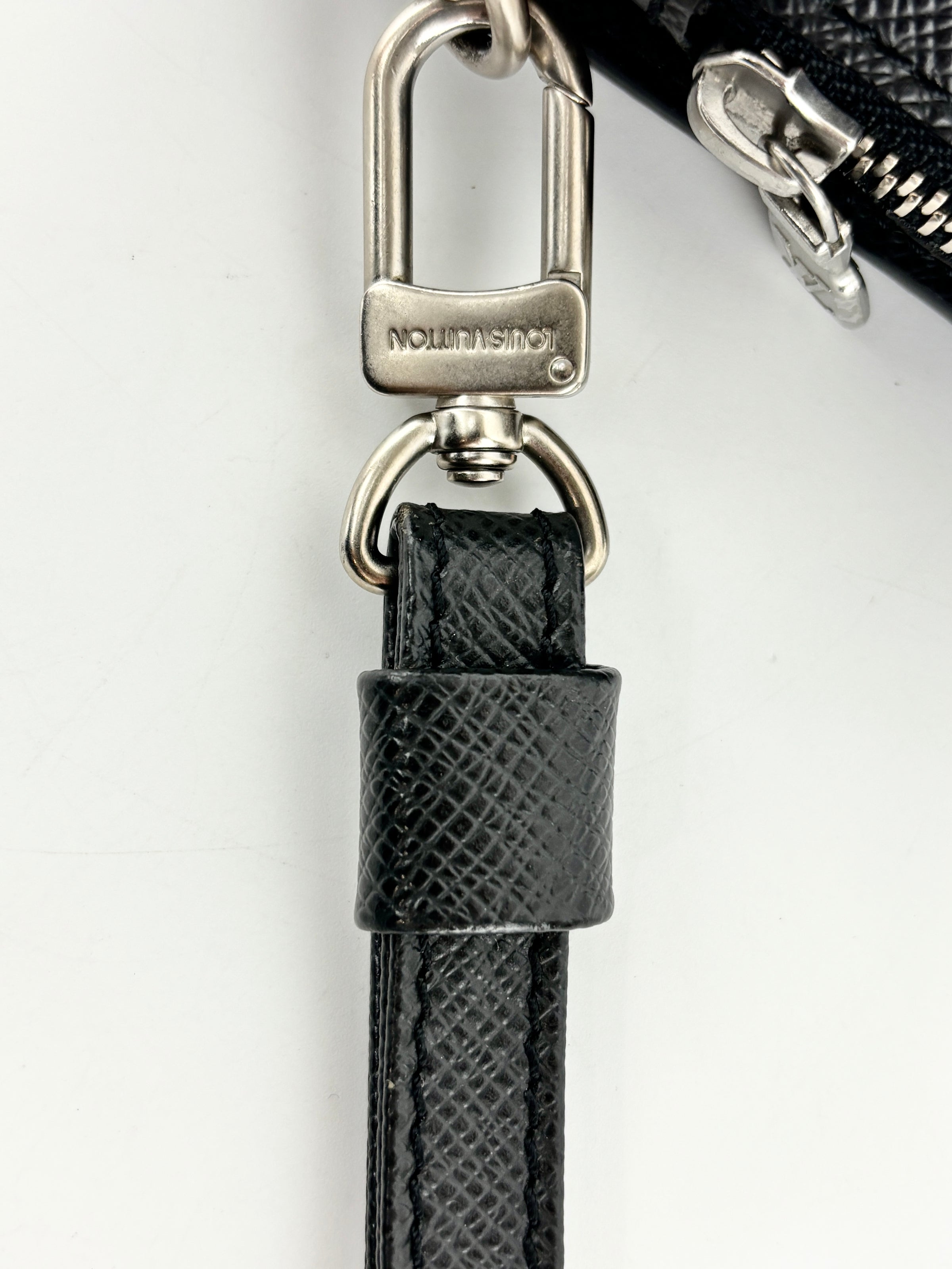 M30182 Taiga Leather Pochette Baikal Clutch