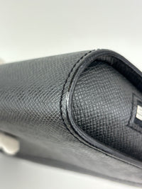 M30182 Taiga Leather Pochette Baikal Clutch