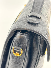 Pochette Metis in Noir Monogram Empreinte Leather