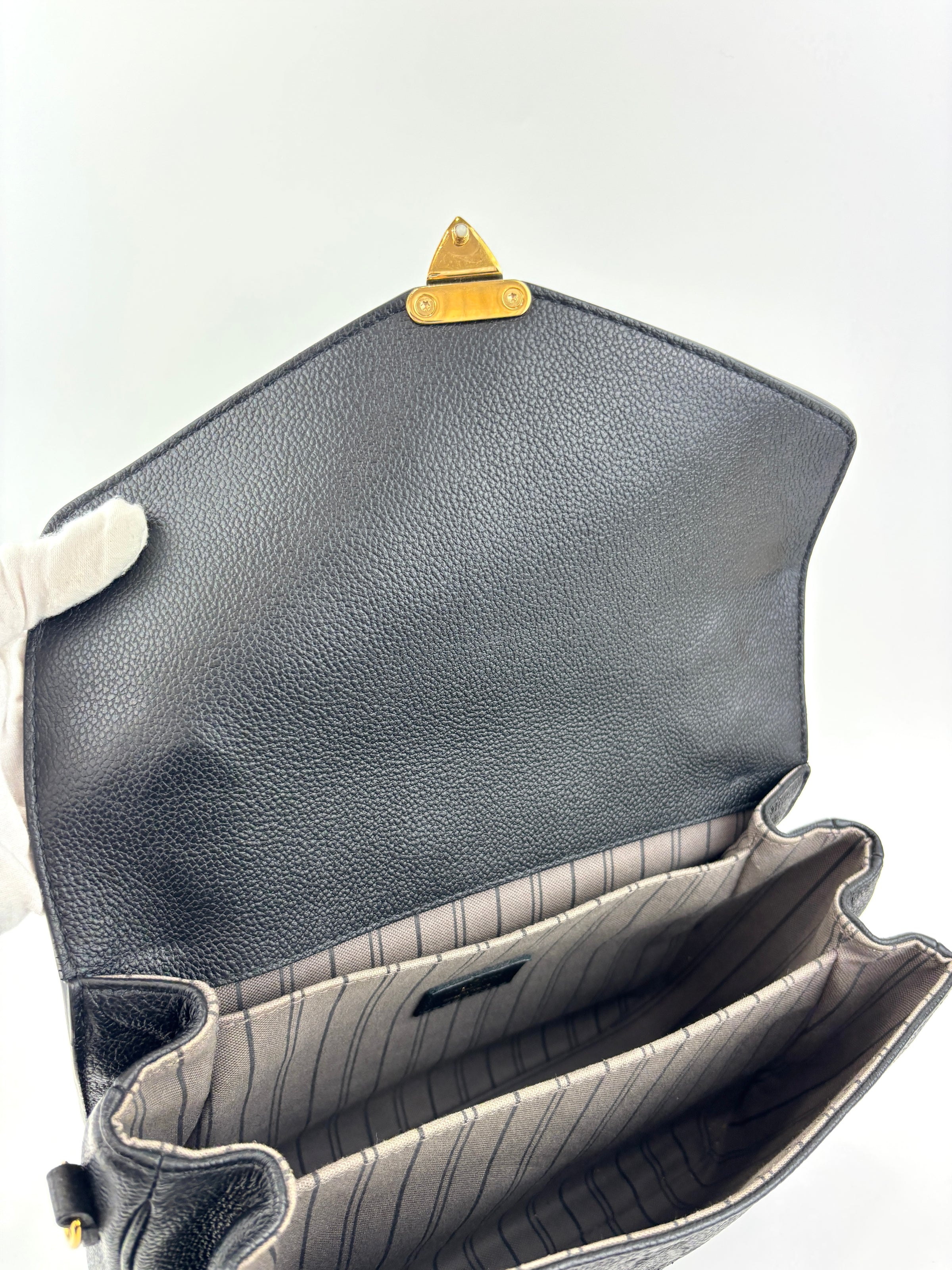 Pochette Metis in Noir Monogram Empreinte Leather