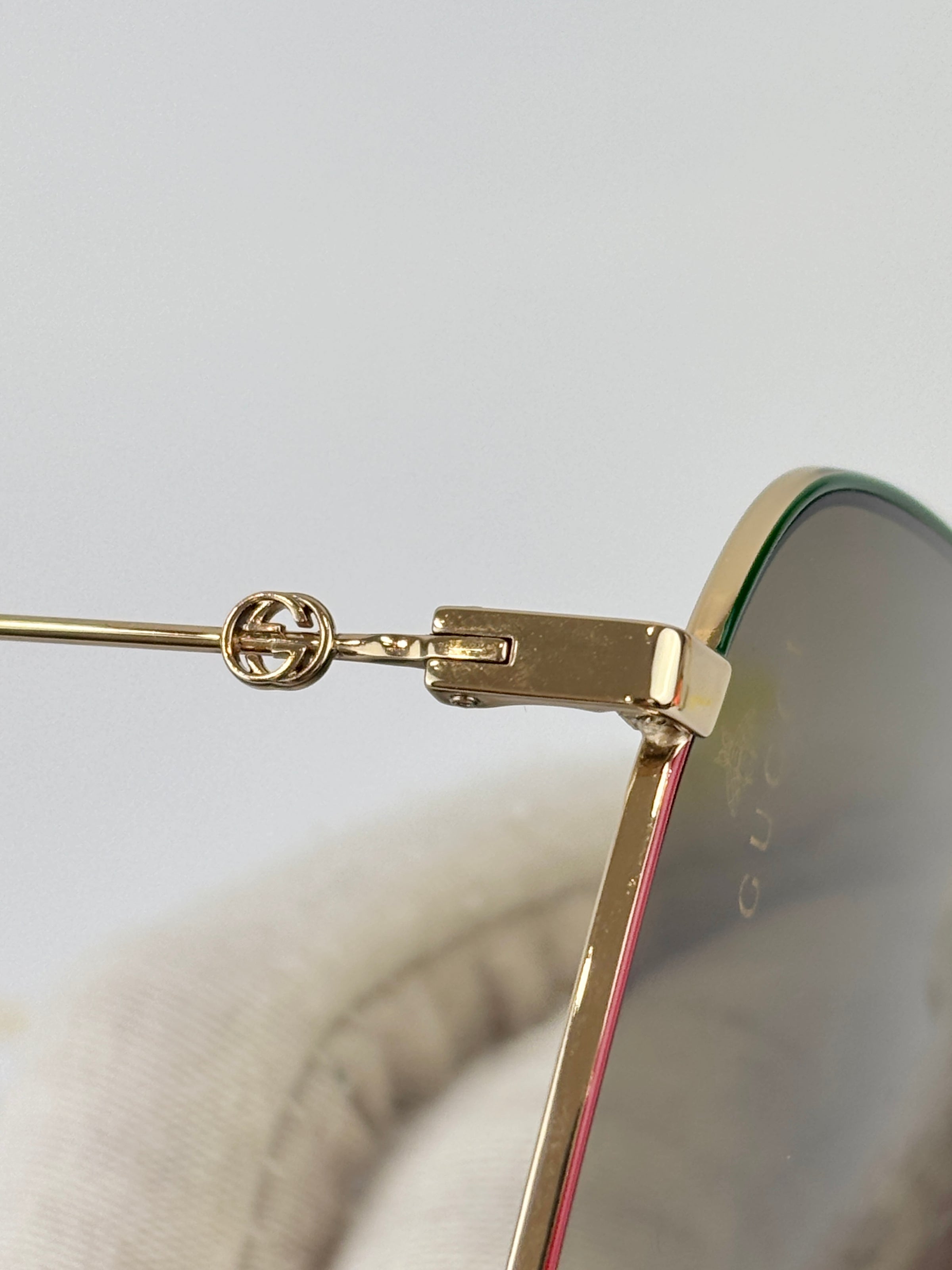 GG0394S Rectangular Metal Sunglasses in Green/Red with Gold Detail