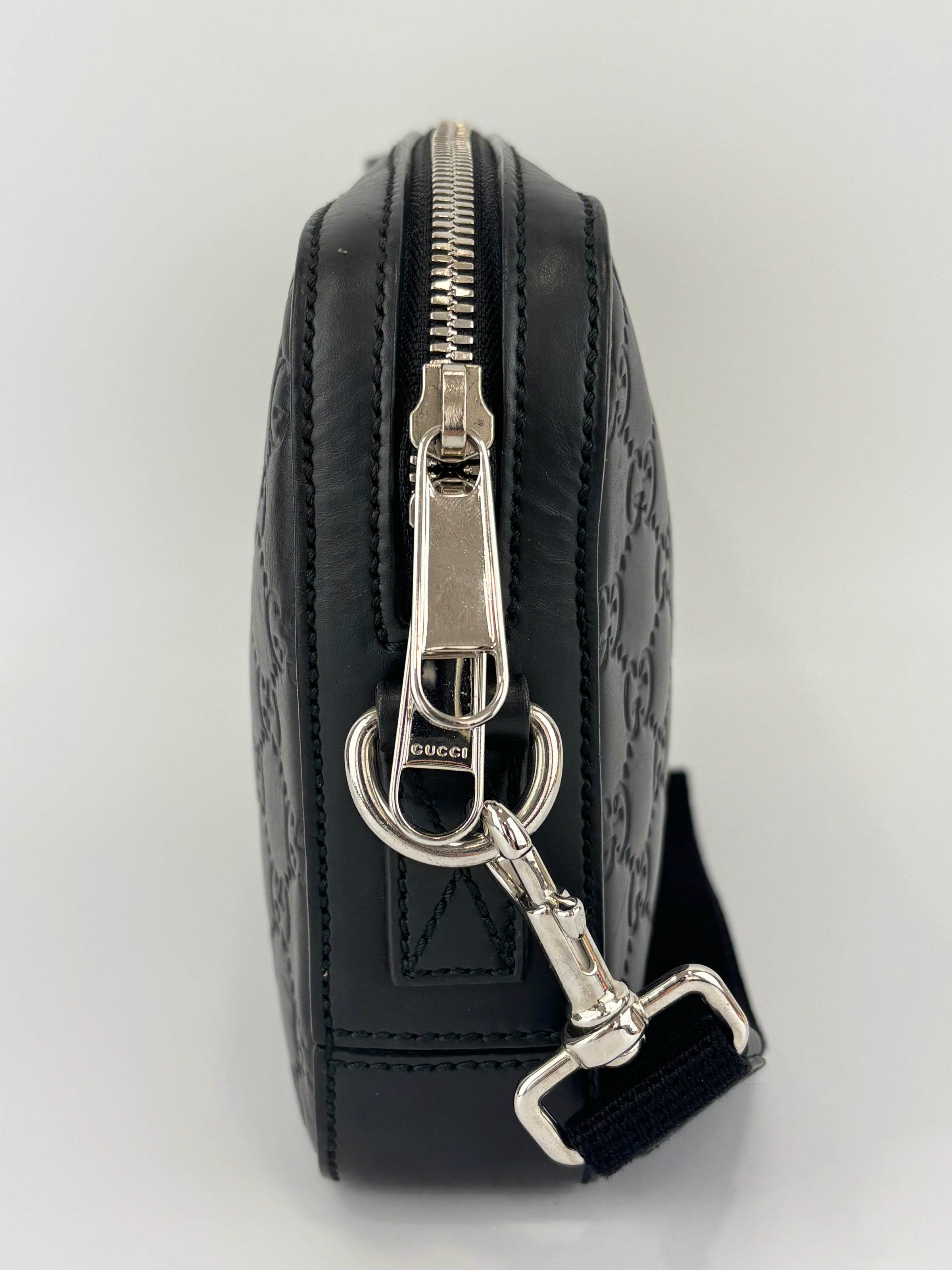 Signature Guccissima Embossed Leather Zip Clutch with Wristlet
