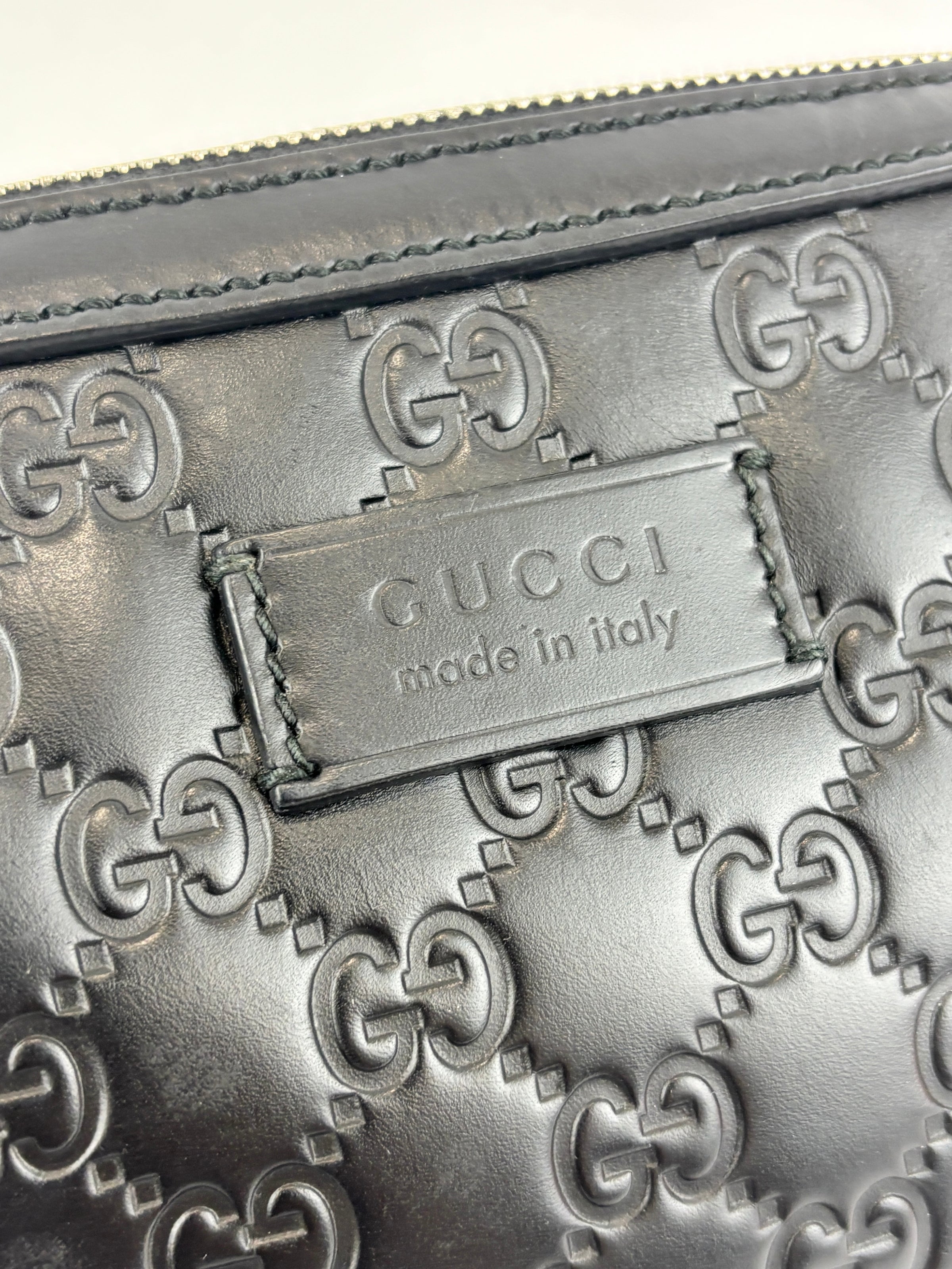 Signature Guccissima Embossed Leather Zip Clutch with Wristlet