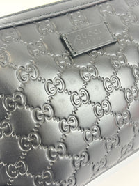 Signature Guccissima Embossed Leather Zip Clutch with Wristlet