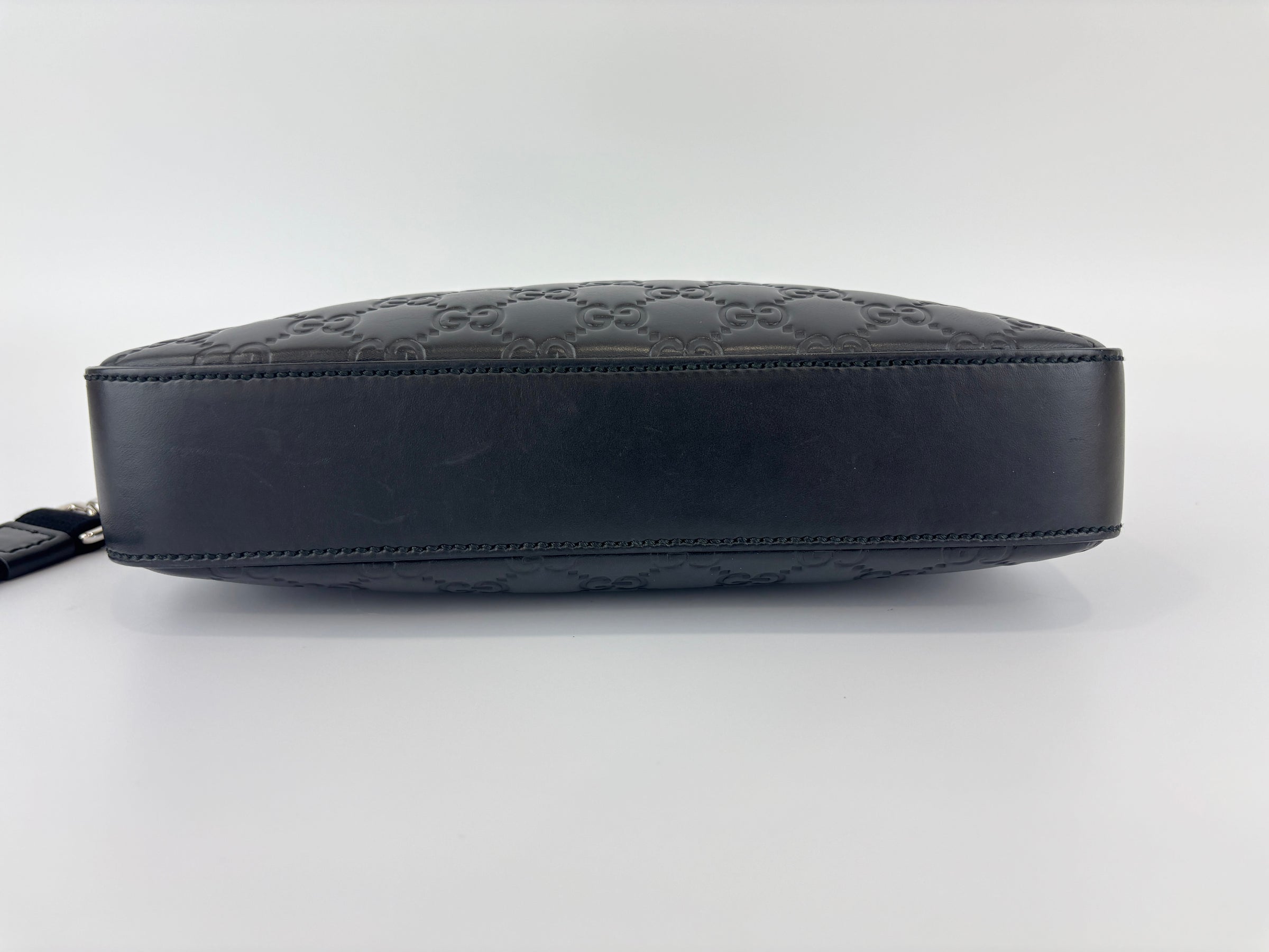 Signature Guccissima Embossed Leather Zip Clutch with Wristlet