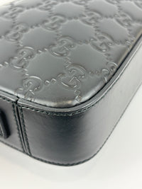 Signature Guccissima Embossed Leather Zip Clutch with Wristlet
