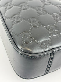 Signature Guccissima Embossed Leather Zip Clutch with Wristlet
