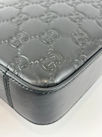 Signature Guccissima Embossed Leather Zip Clutch with Wristlet