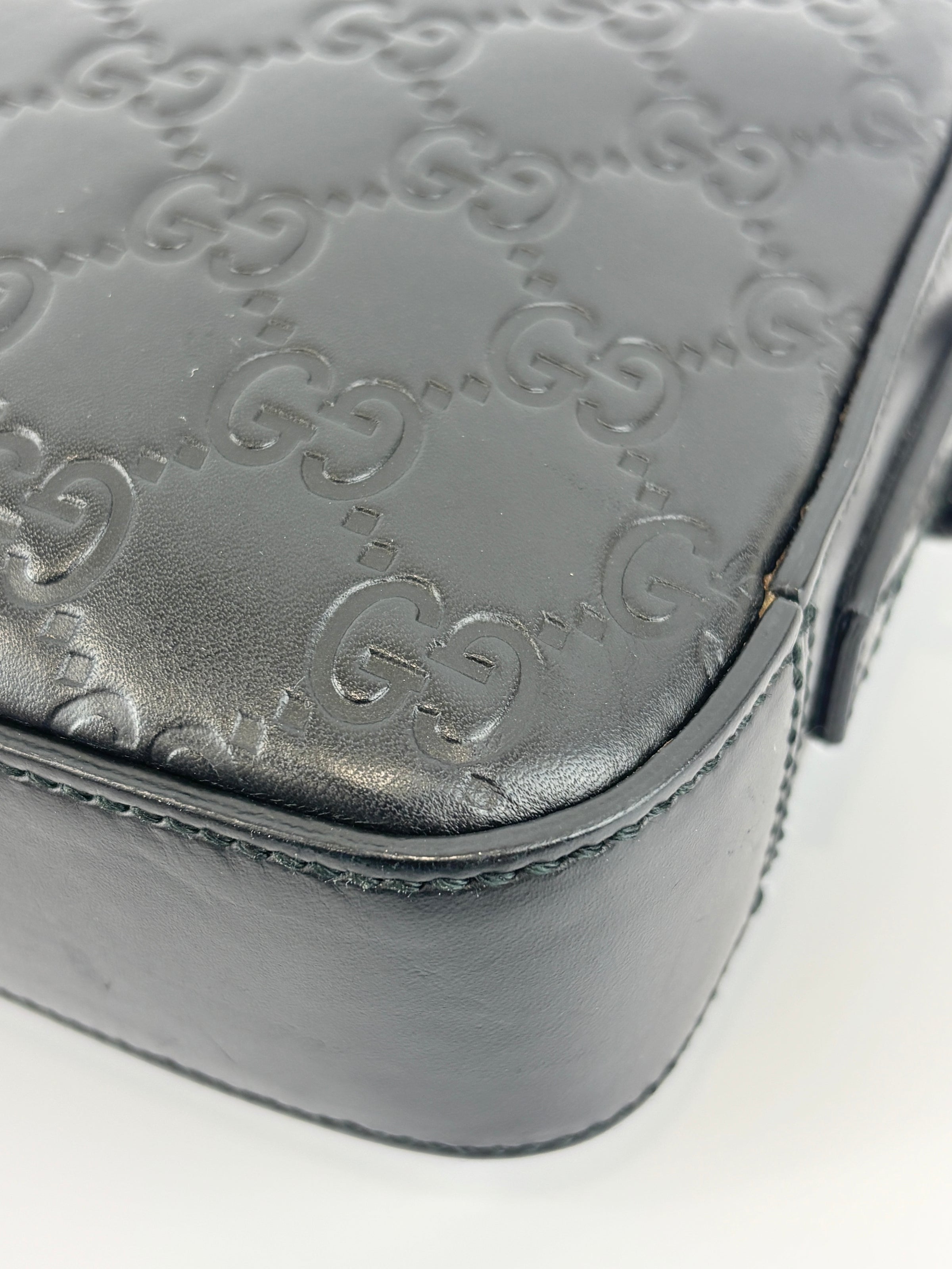 Signature Guccissima Embossed Leather Zip Clutch with Wristlet