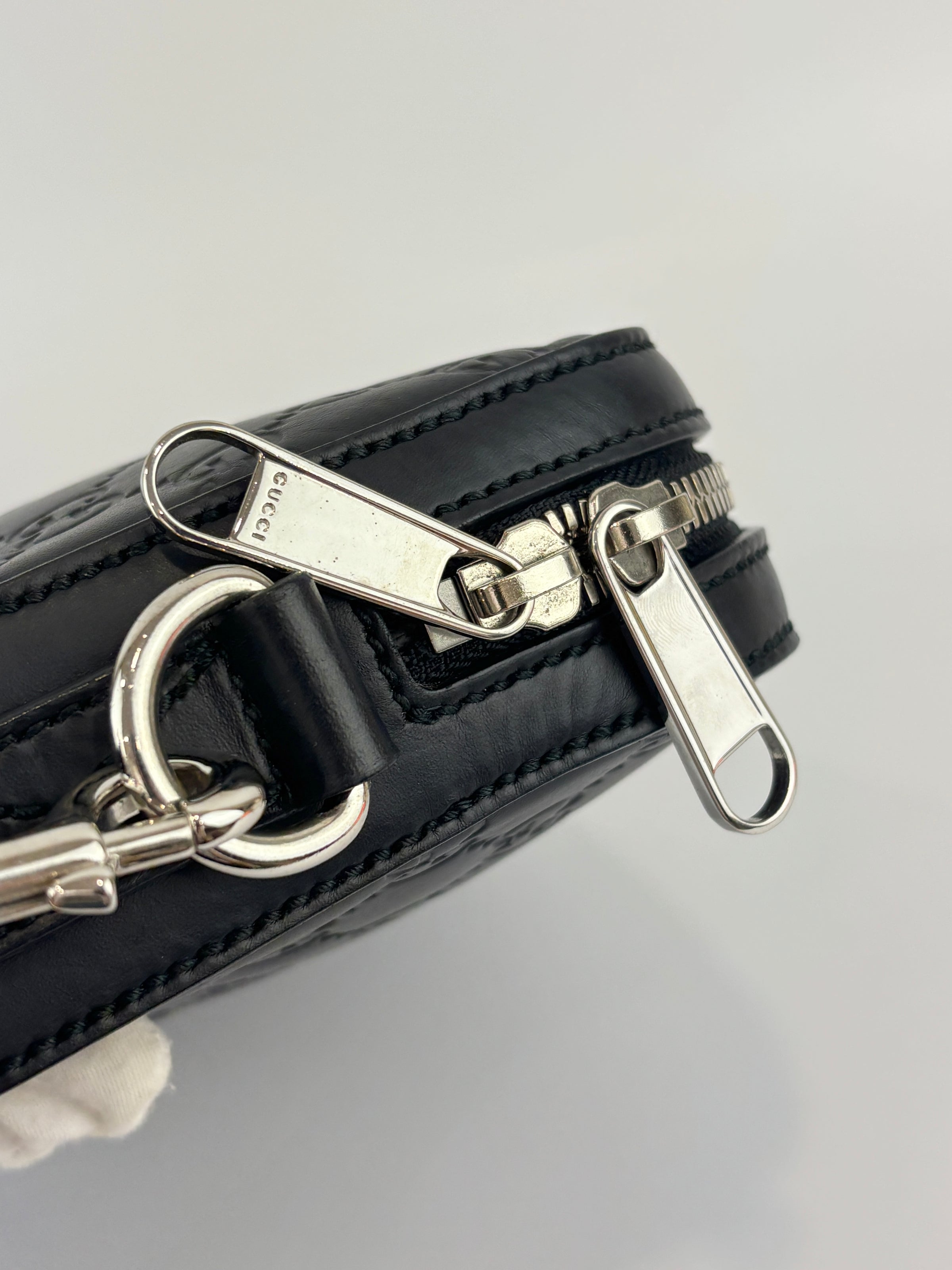 Signature Guccissima Embossed Leather Zip Clutch with Wristlet