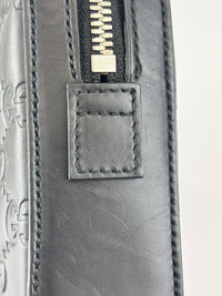Signature Guccissima Embossed Leather Zip Clutch with Wristlet