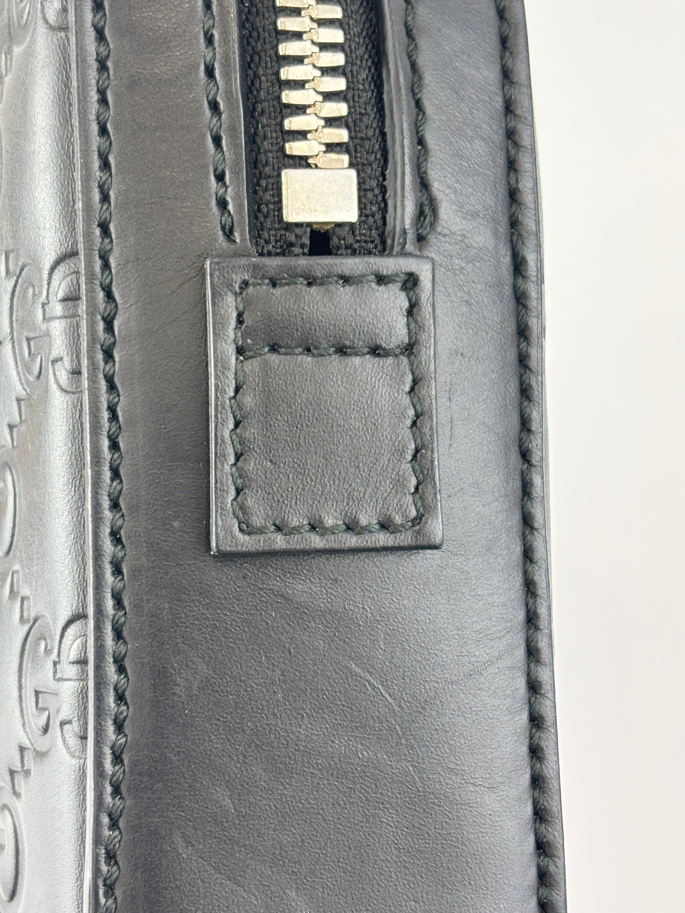 Signature Guccissima Embossed Leather Zip Clutch with Wristlet