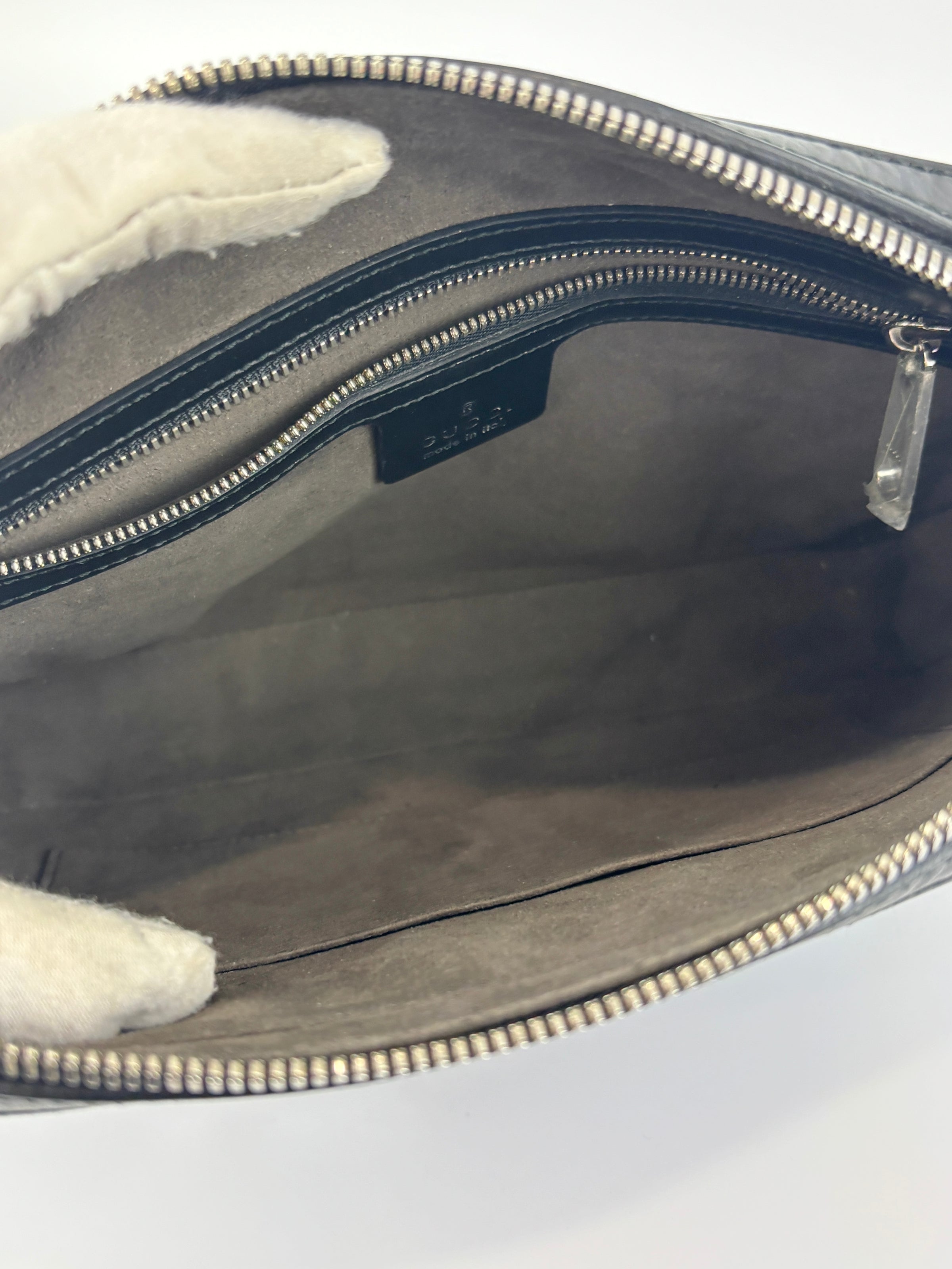 Signature Guccissima Embossed Leather Zip Clutch with Wristlet