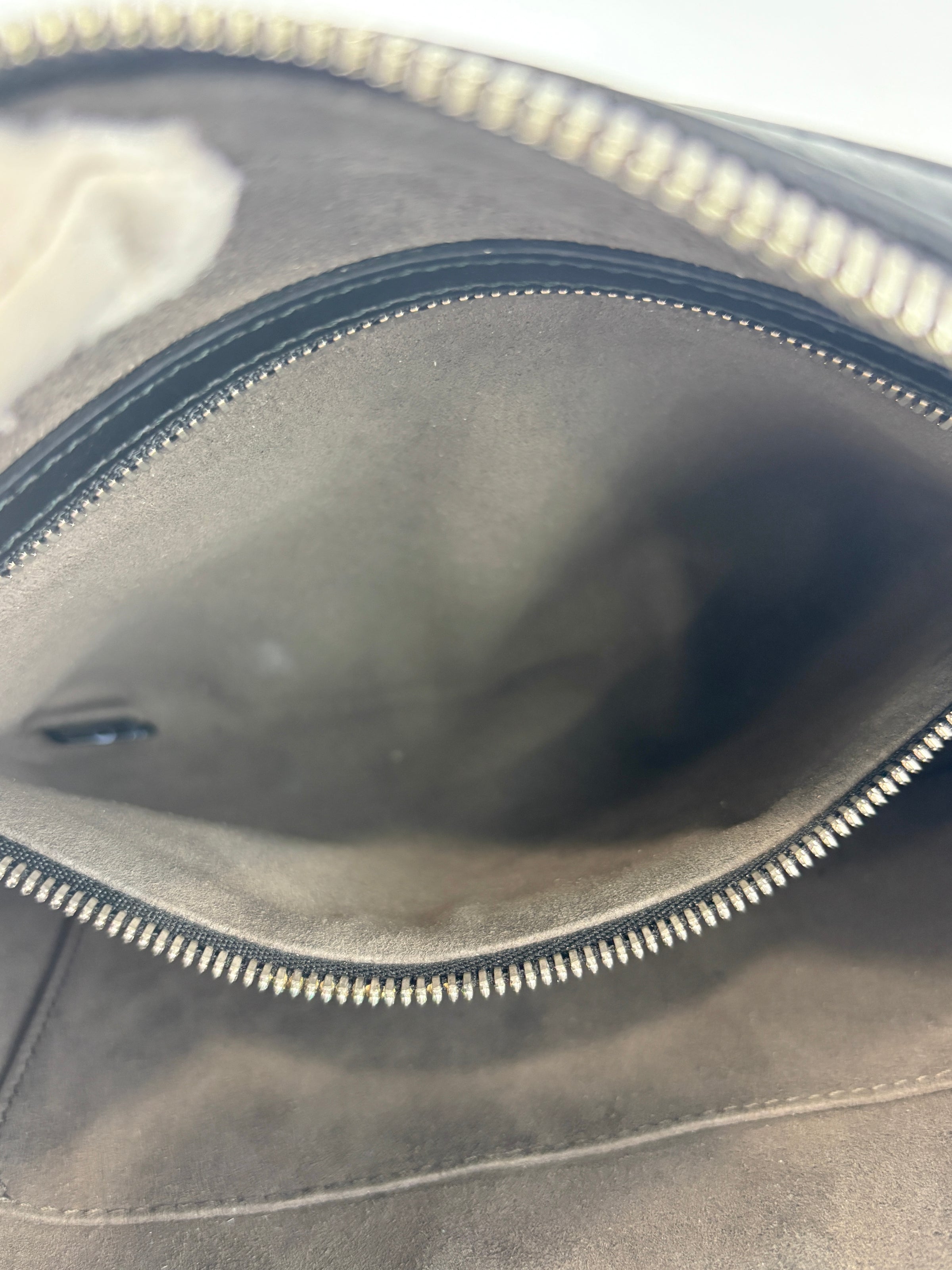 Signature Guccissima Embossed Leather Zip Clutch with Wristlet