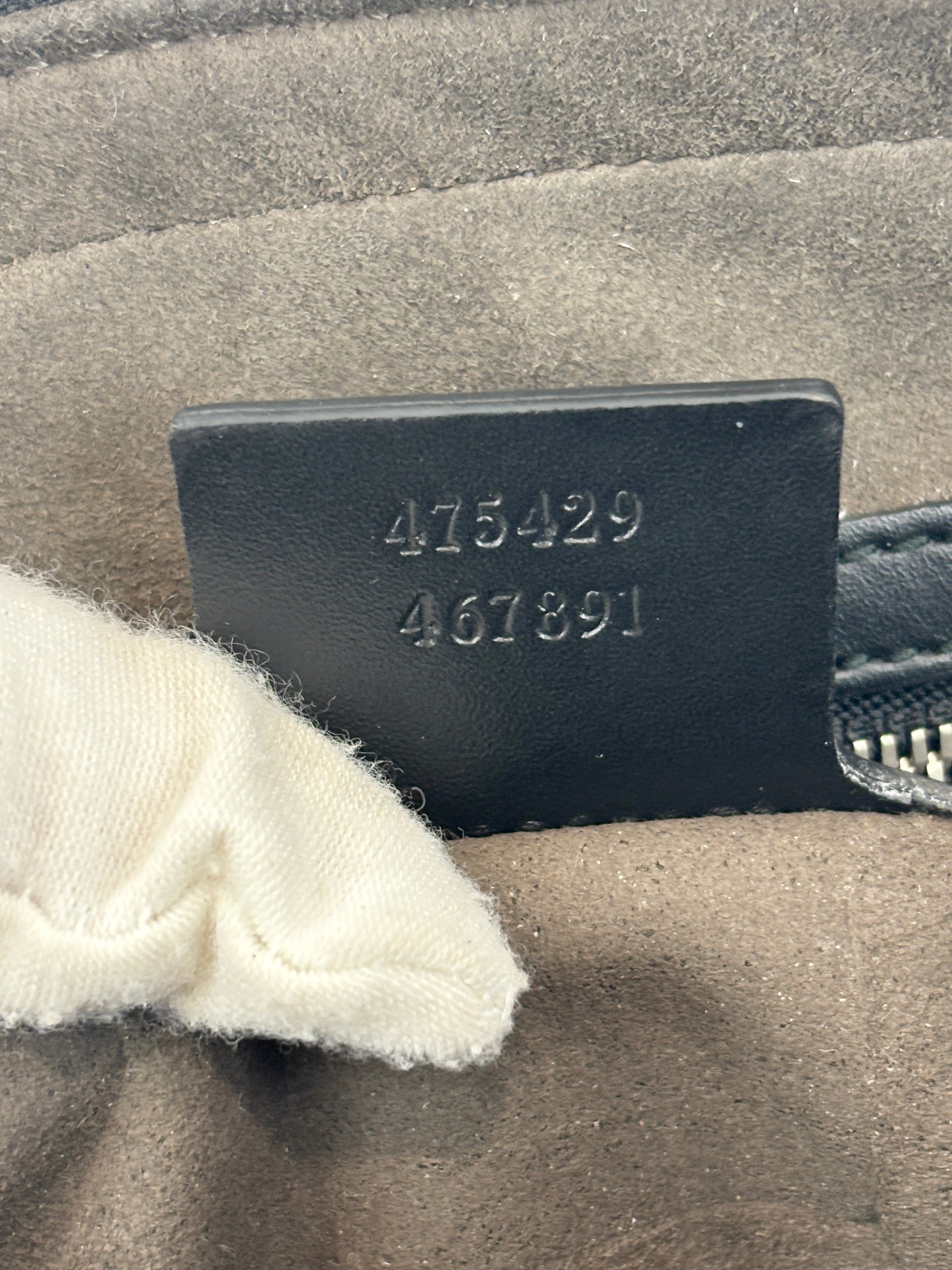 Signature Guccissima Embossed Leather Zip Clutch with Wristlet