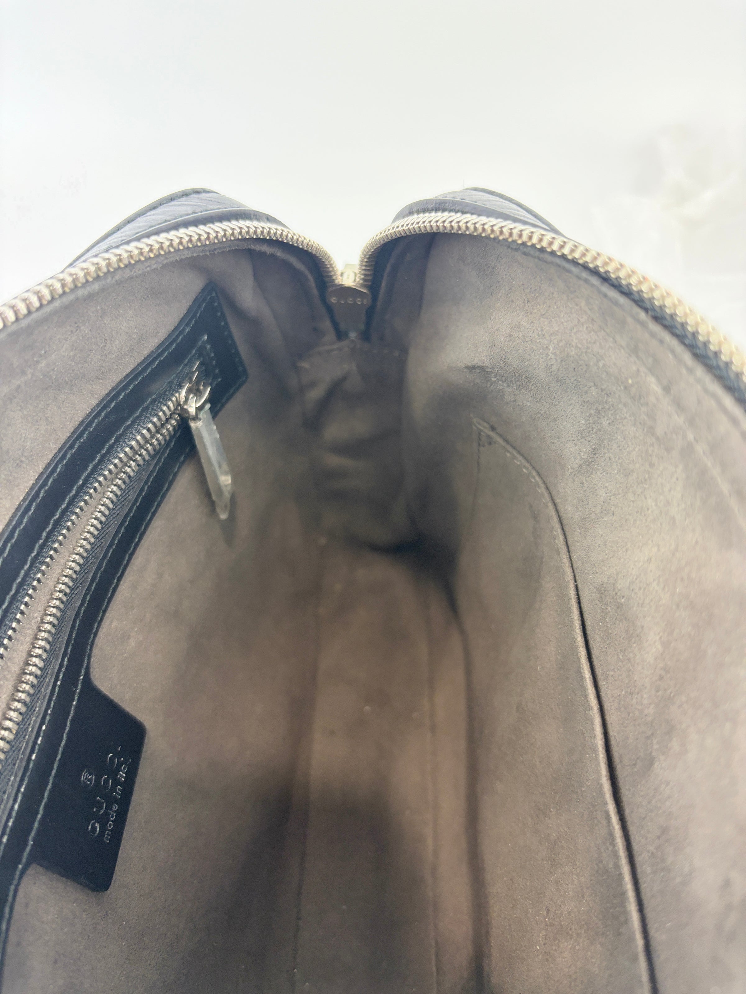 Signature Guccissima Embossed Leather Zip Clutch with Wristlet