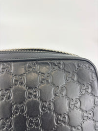 Signature Guccissima Embossed Leather Zip Clutch with Wristlet