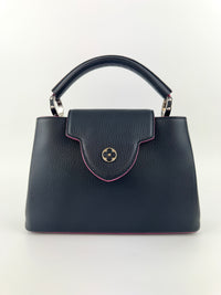 Capucines BB in Black Taurillon Leather/Fuschia SHW