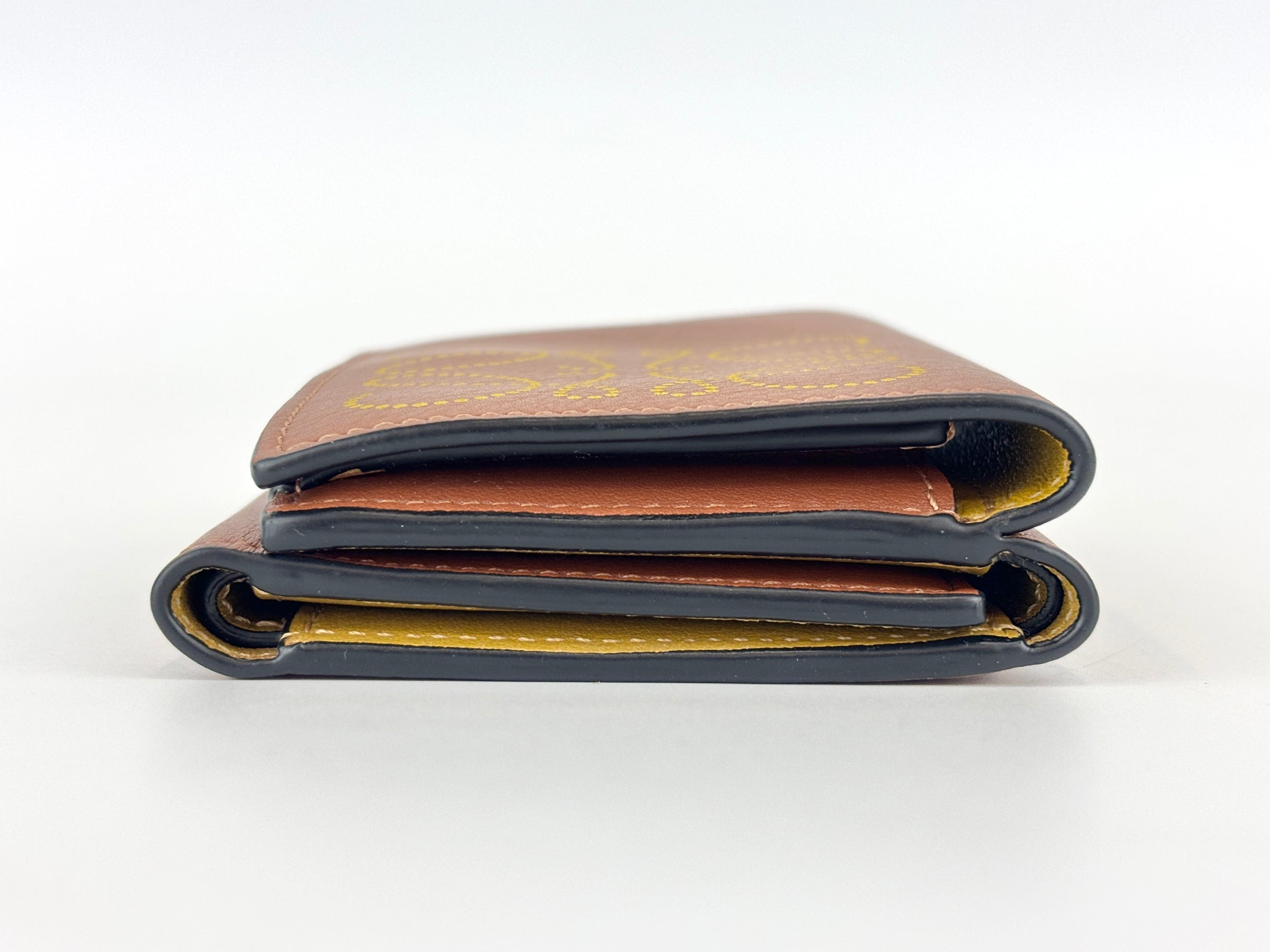 Anagram Trifold Compact Wallet in Brown Calfskin