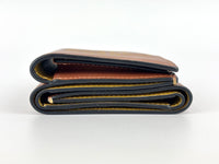 Anagram Trifold Compact Wallet in Brown Calfskin
