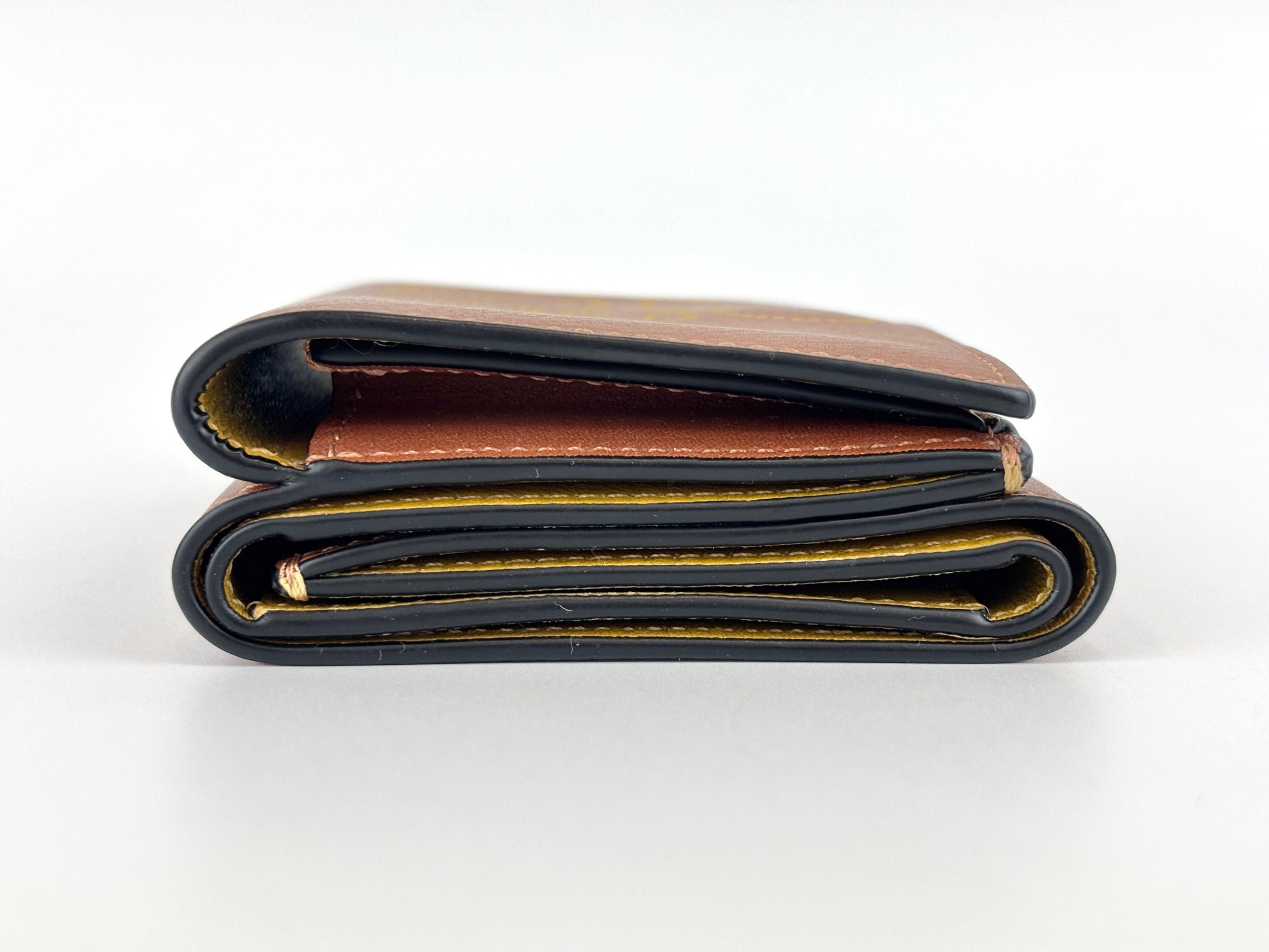 Anagram Trifold Compact Wallet in Brown Calfskin