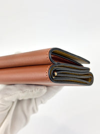 Anagram Trifold Compact Wallet in Brown Calfskin