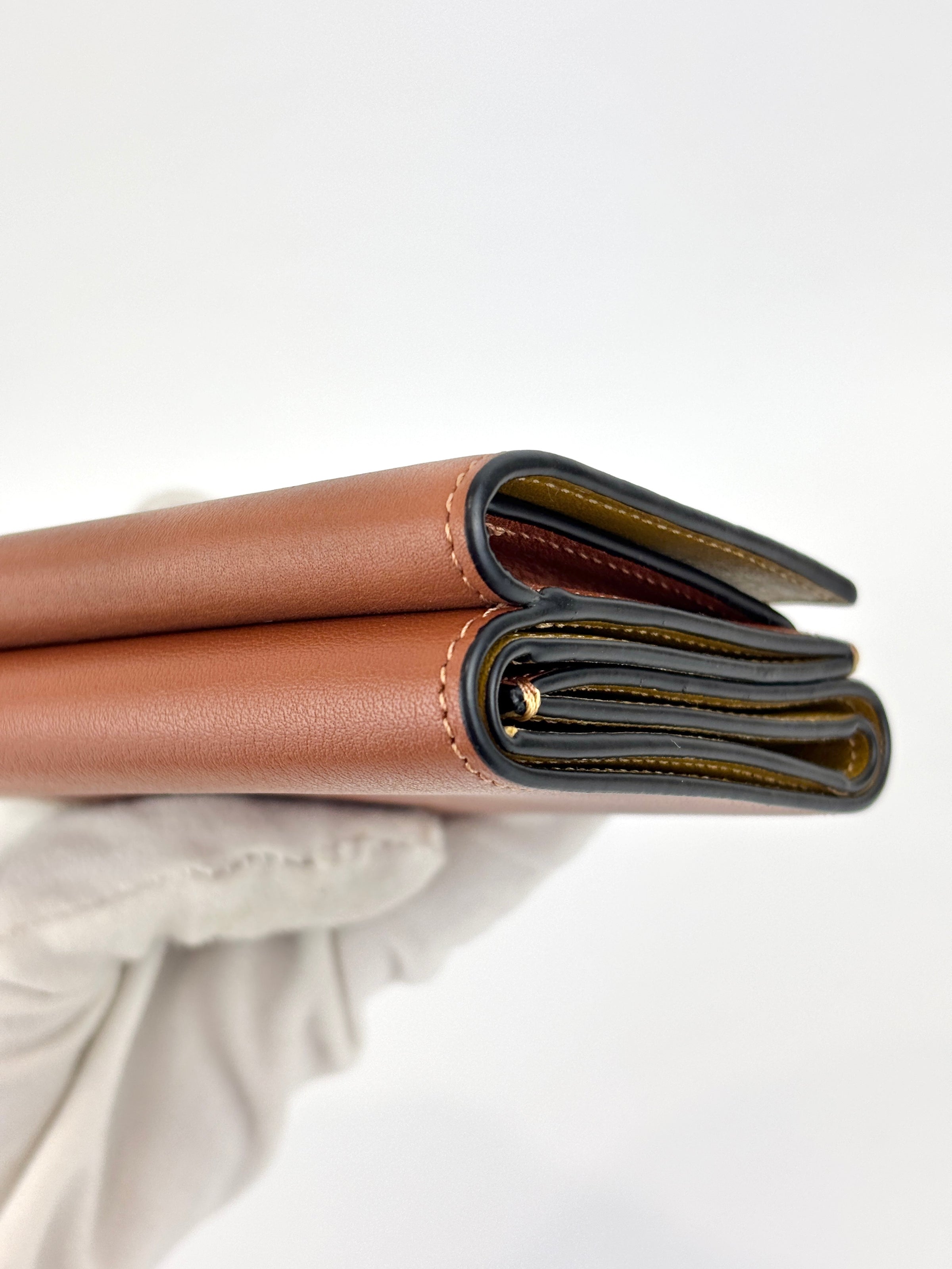 Anagram Trifold Compact Wallet in Brown Calfskin