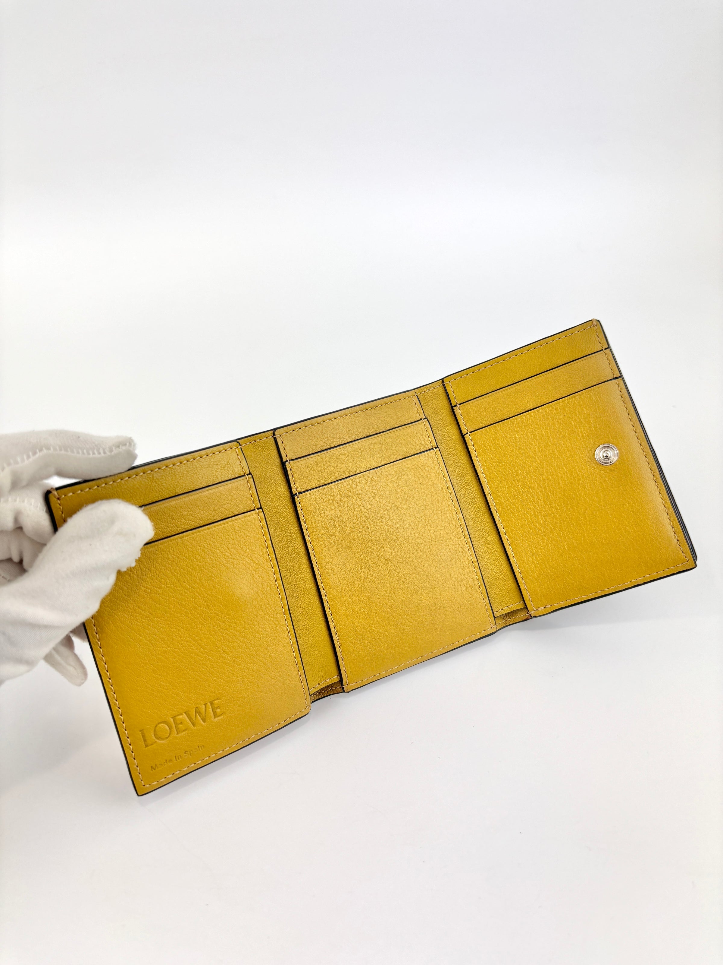 Anagram Trifold Compact Wallet in Brown Calfskin