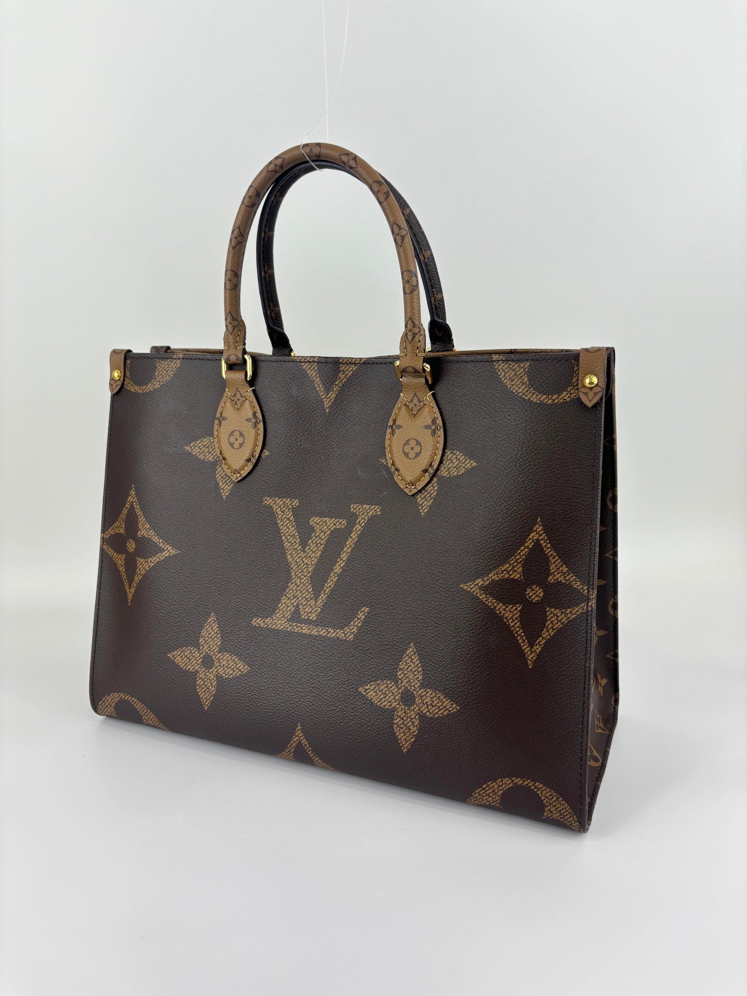 OnTheGo MM Monogram Reverse