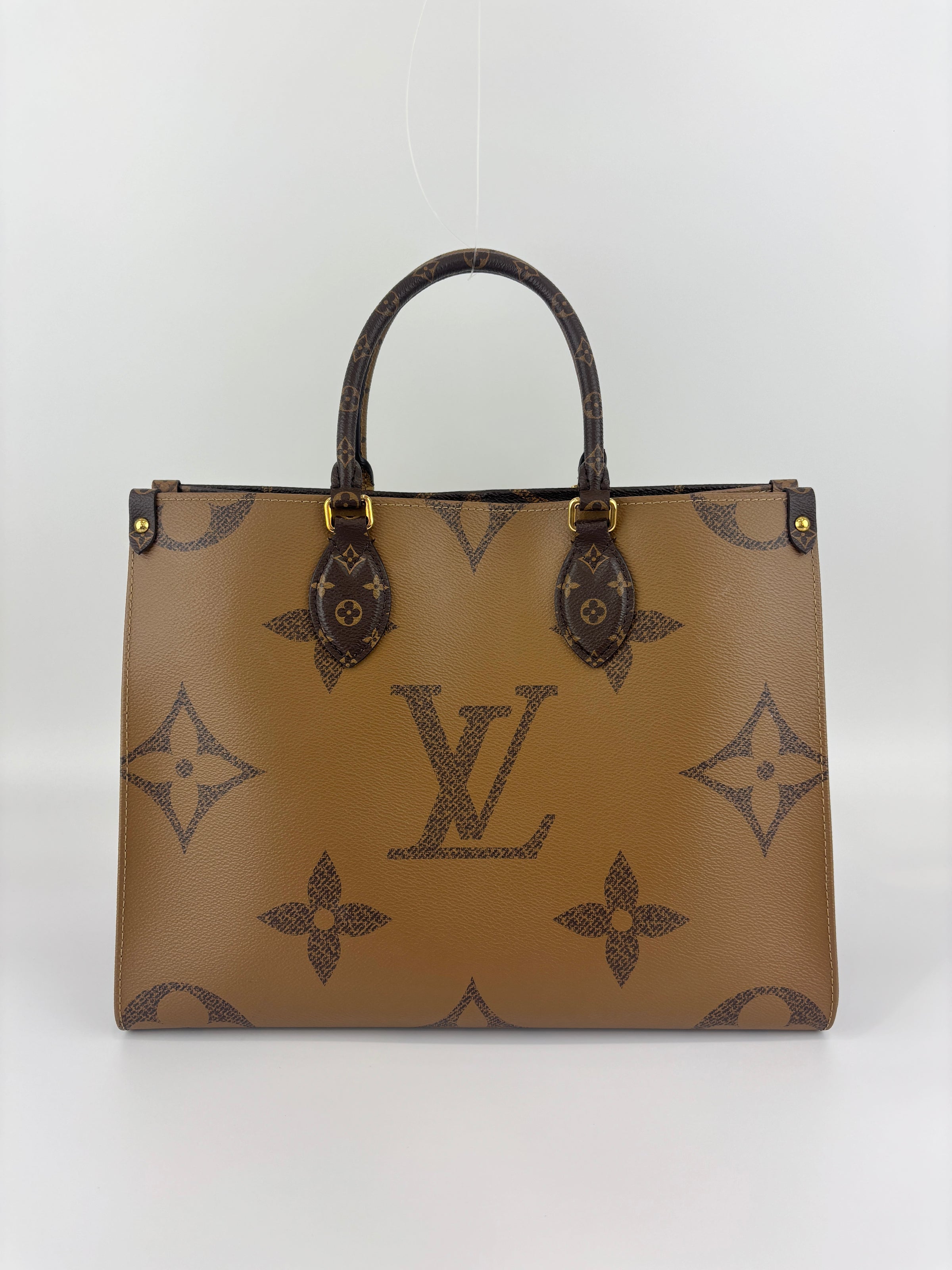 OnTheGo MM Monogram Reverse