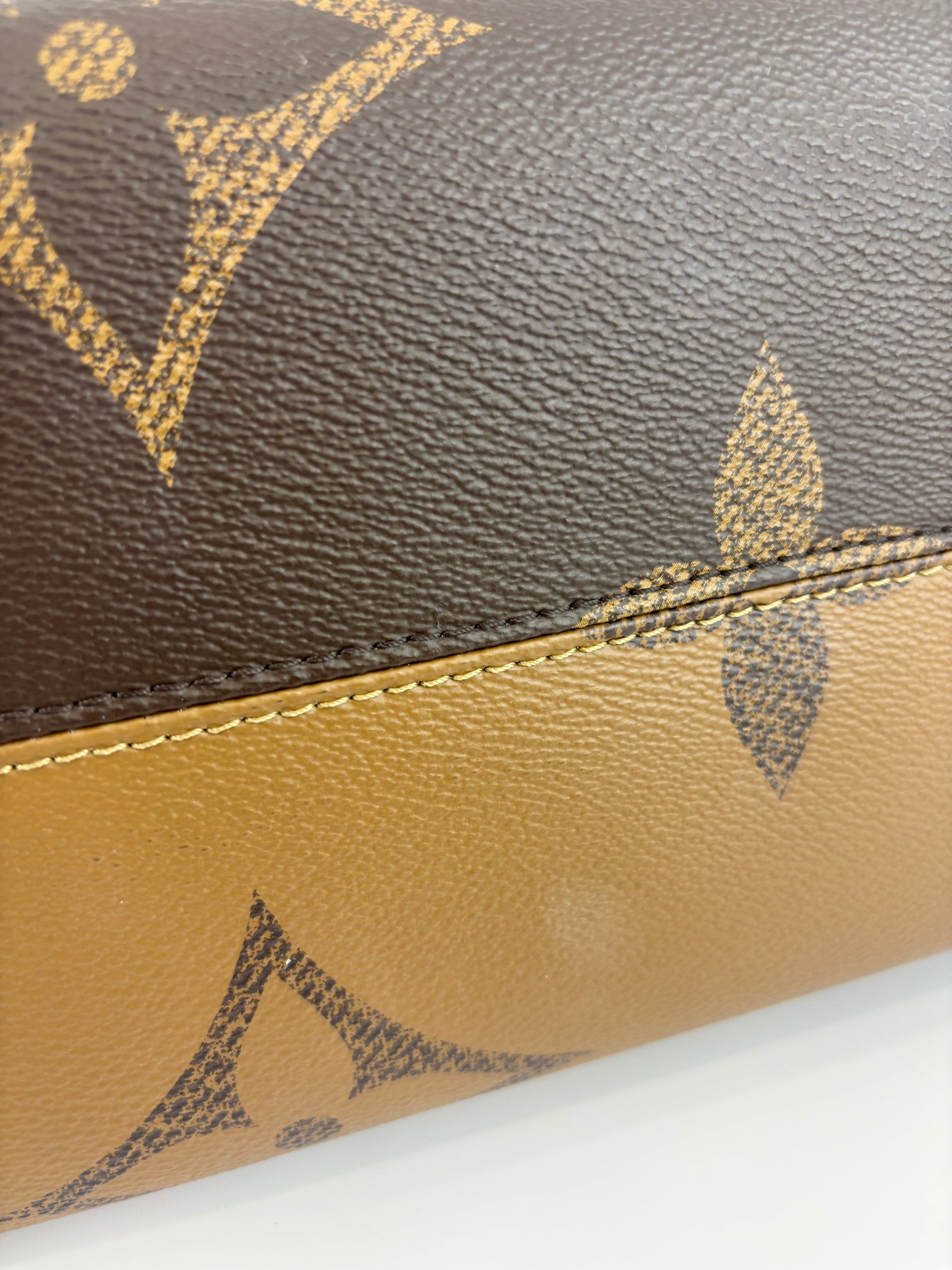 OnTheGo MM Monogram Reverse