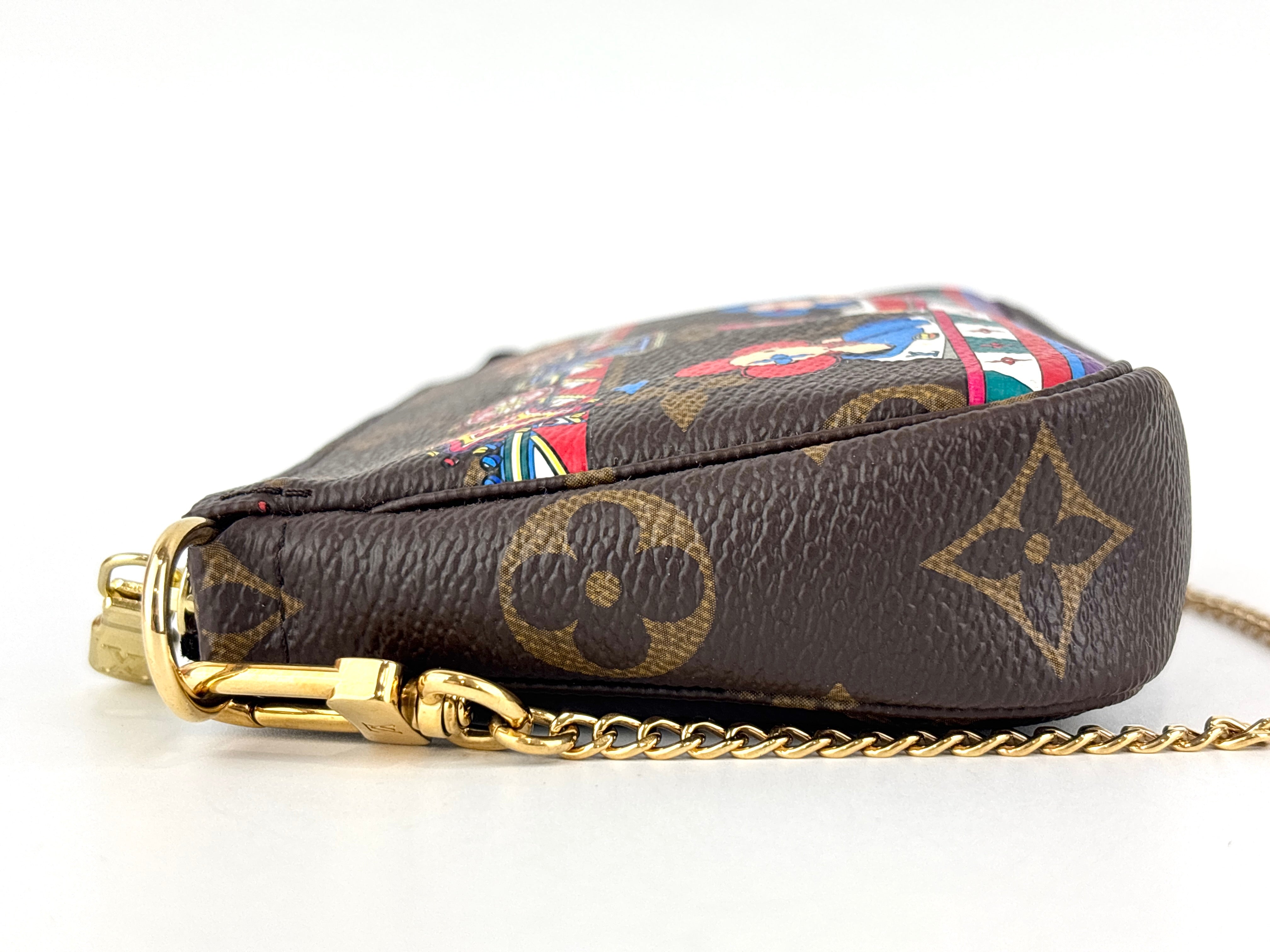 Louis Vuitton Vivienne Mini Pochette Accessoires M69976 | Glampot Louis Vuitton Vivienne Mini Pochette Accessoires M69976 | Glampot
