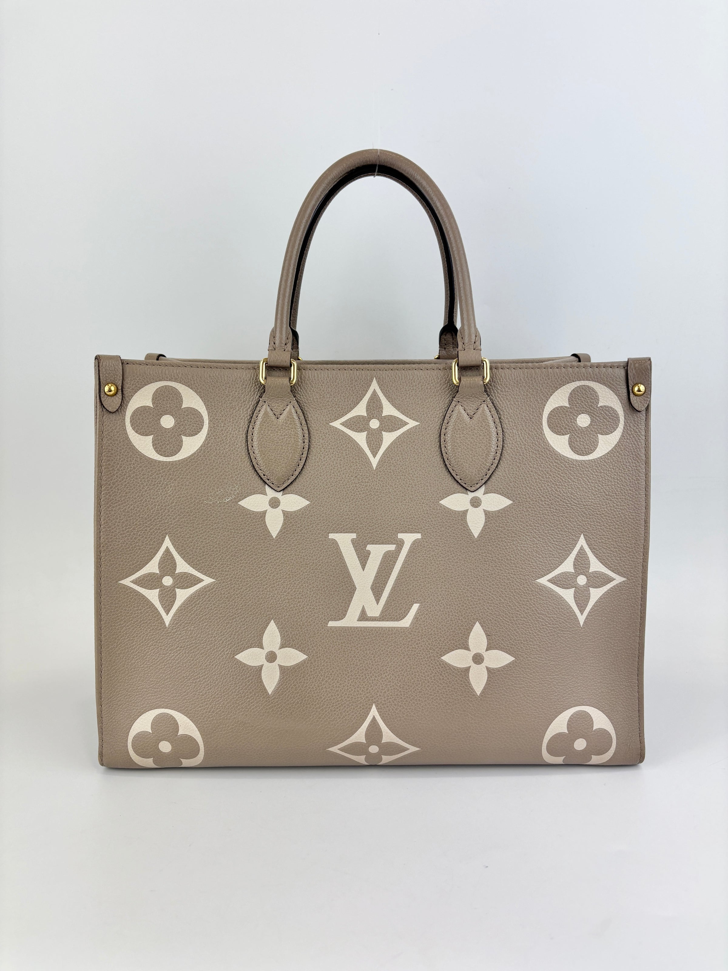 Onthego MM Bicolour Monogram Empreinte Leather Tourterelle / Crème