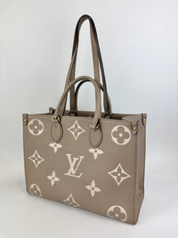 Onthego MM Bicolour Monogram Empreinte Leather Tourterelle / Crème