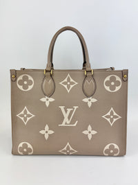 Onthego MM Bicolour Monogram Empreinte Leather Tourterelle / Crème
