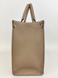 Onthego MM Bicolour Monogram Empreinte Leather Tourterelle / Crème
