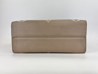 Onthego MM Bicolour Monogram Empreinte Leather Tourterelle / Crème