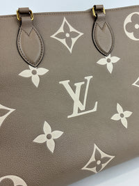 Onthego MM Bicolour Monogram Empreinte Leather Tourterelle / Crème